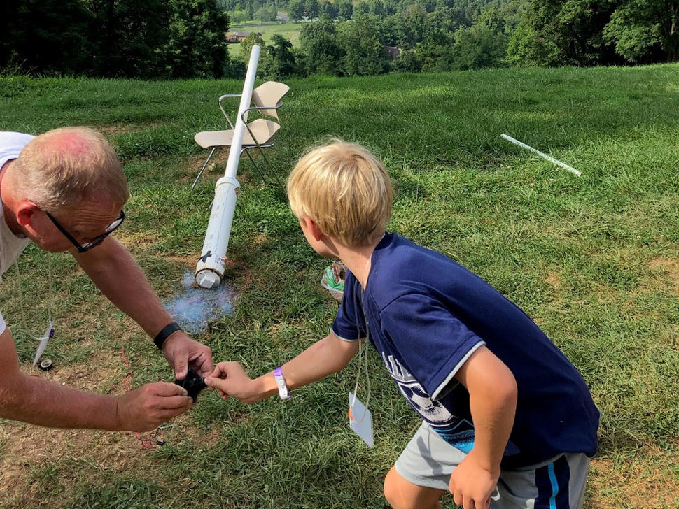 Camper and counselor launch potato rockets at Camp Fantastic