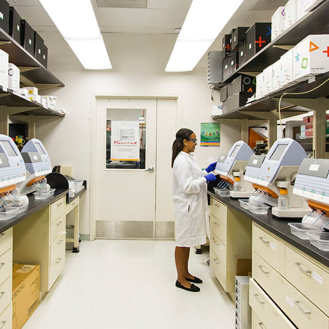 Woman working in a scientific laboratory.