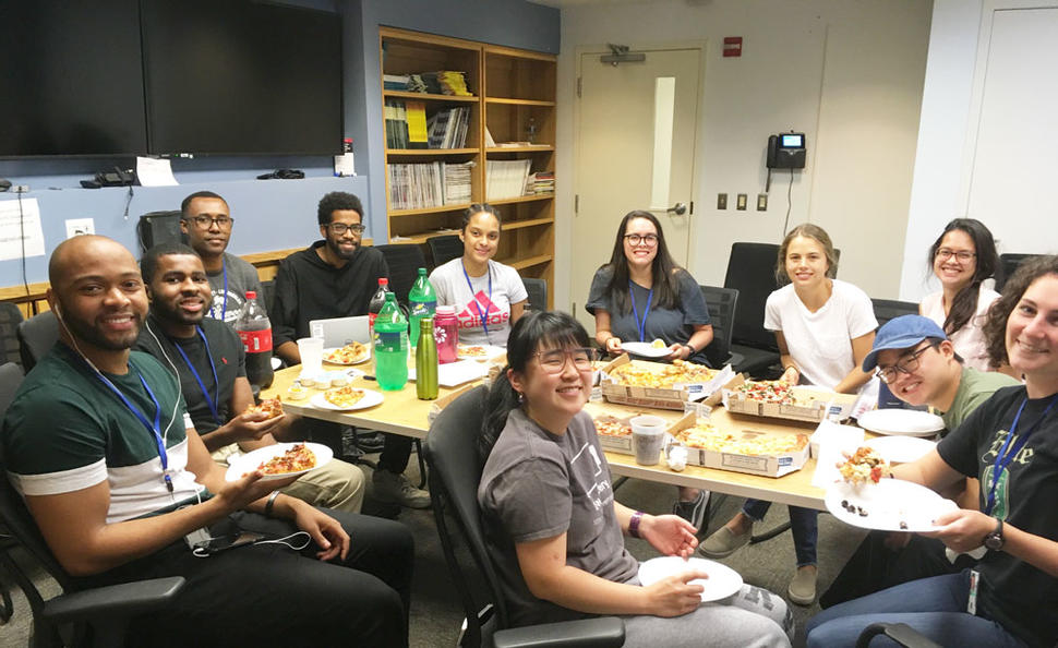 Dr. Prokunina-Olsson summer intern club enjoying a pizza party
