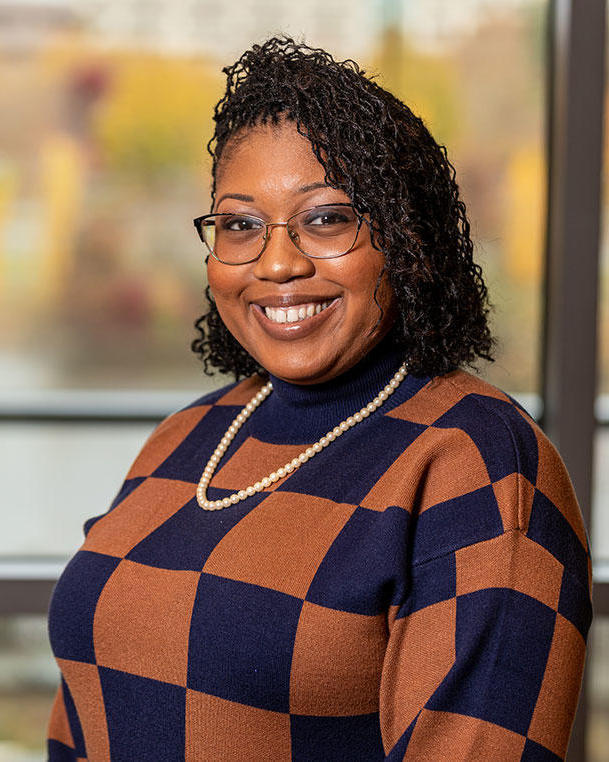 Headshot of Courtney Dill