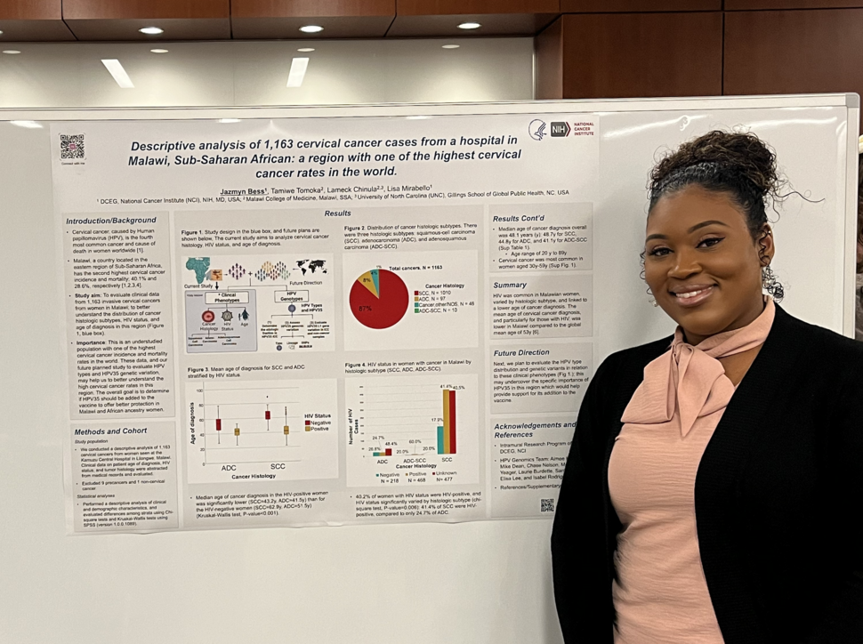 Jazmyn Bess stands next to her poster. 