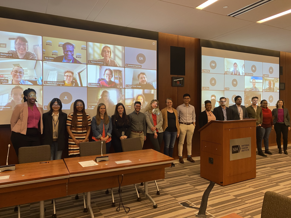 Group photo from the hybrid DCEG fellows symposium.