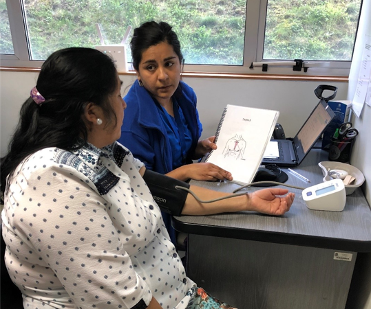 As part of Chile BiLS, a healthcare provider is administering a questionnaire and taking blood pressure of a participant during a second year study visit.&nbsp;