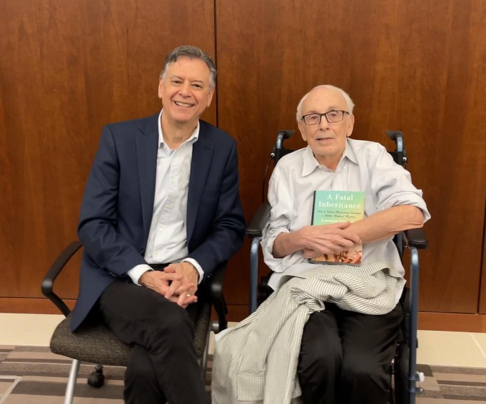 photograph of two men seated