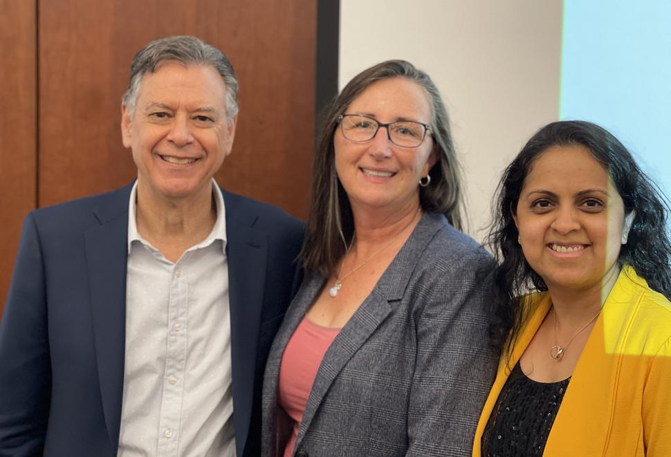 photograph of three people