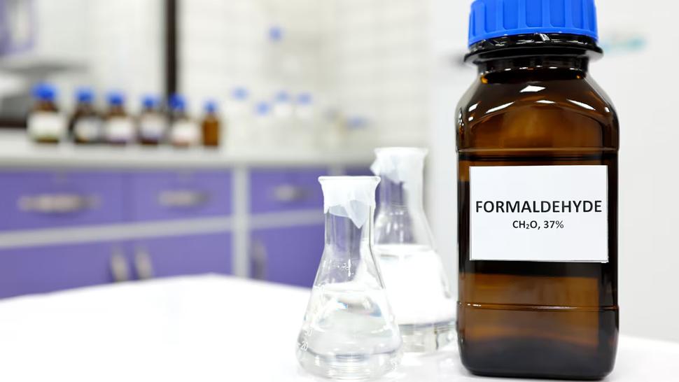 photograph of bottle on lab desk labeled formaldehyde