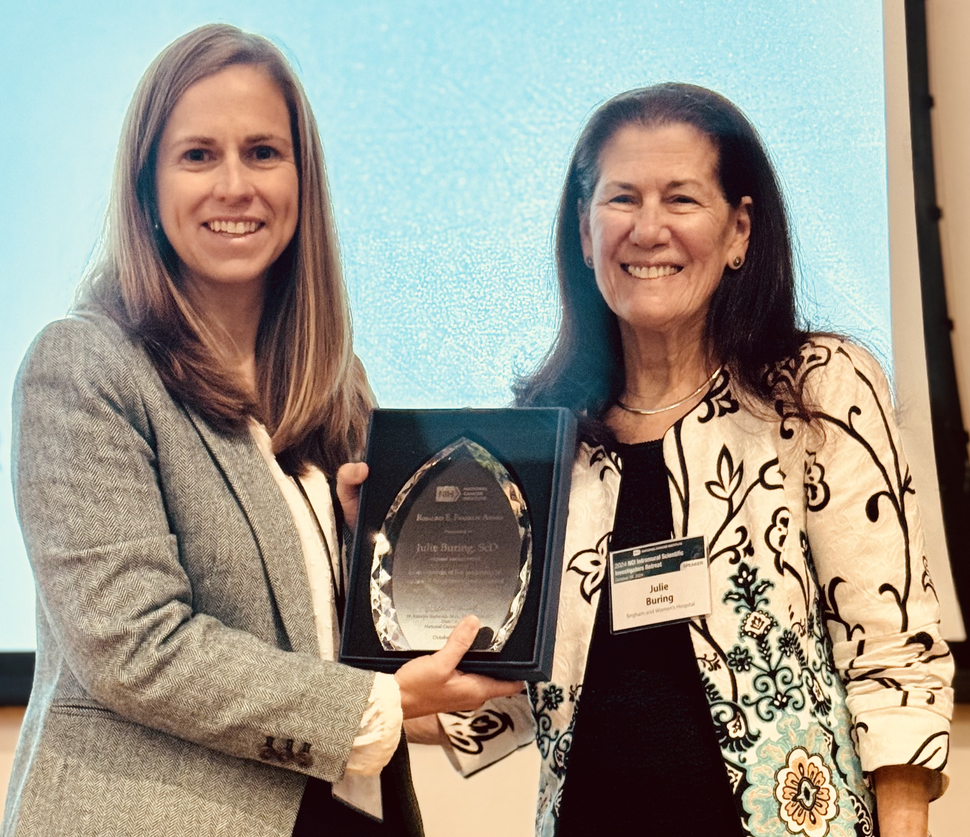 Meredith Shiels presents the 21st Annual NCI Rosalind E. Franklin Award to Julie Buring.