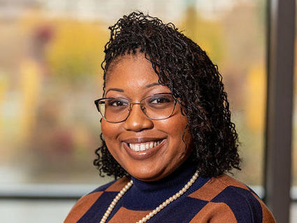 Headshot of Courtney Dill