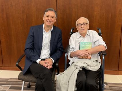 photograph of two men seated