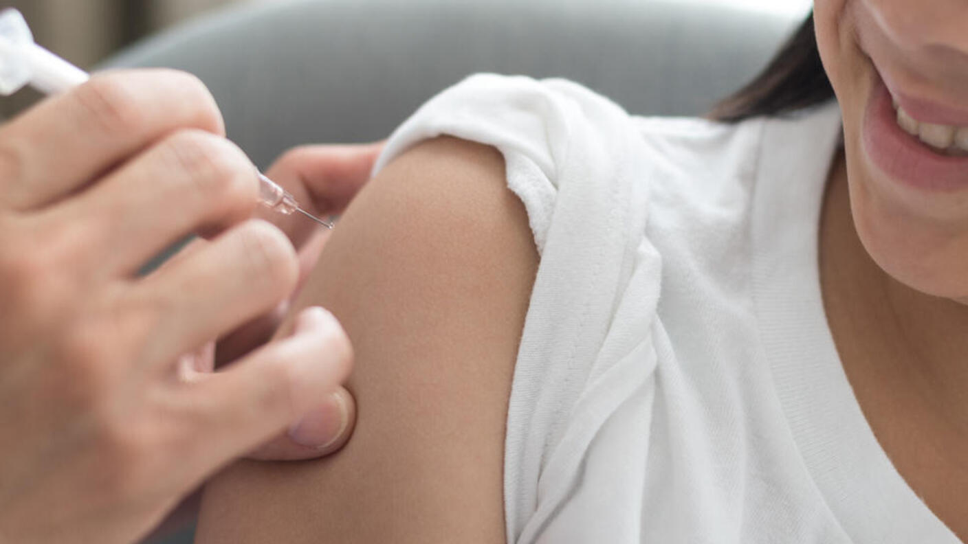 Image of a girl being vaccinated.