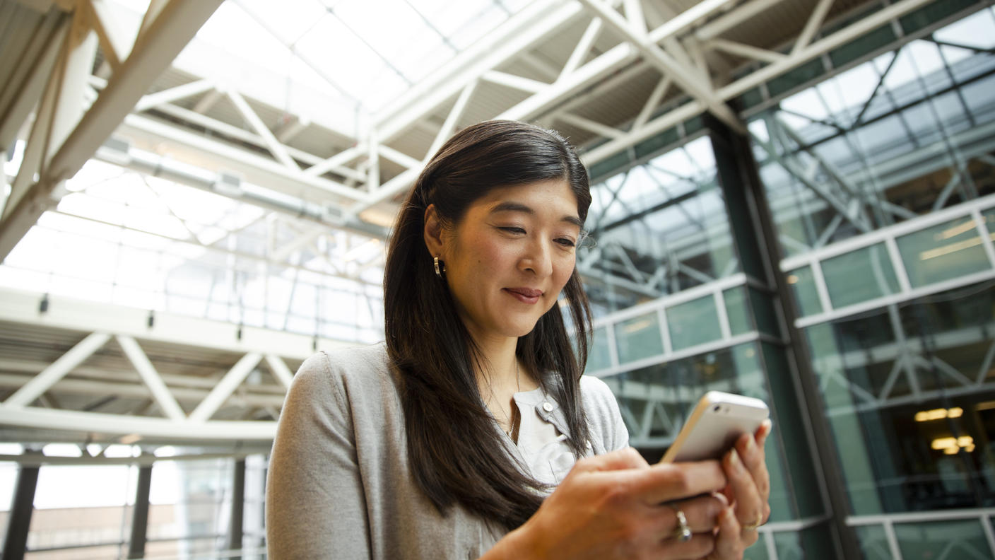 Young woman using a mobile phone.