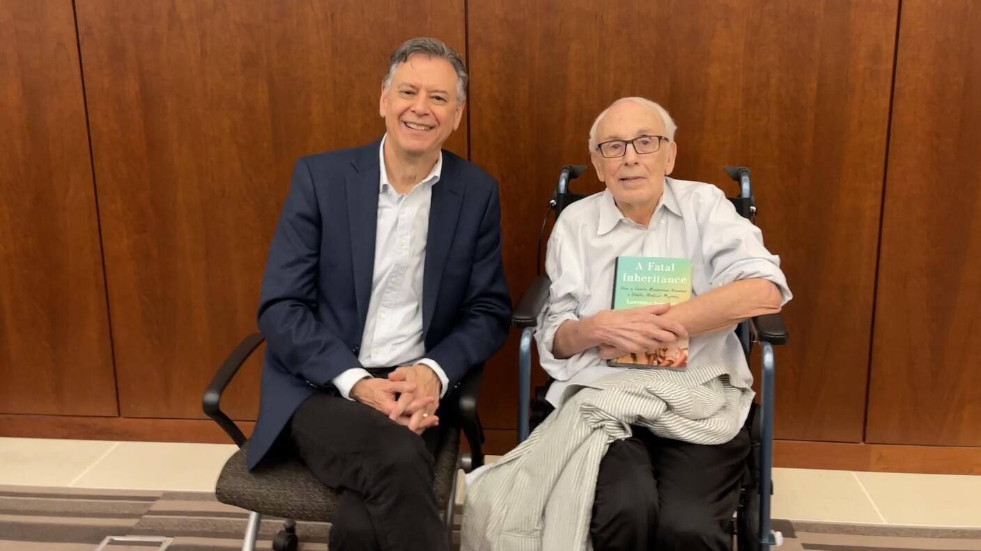 photograph of two men seated