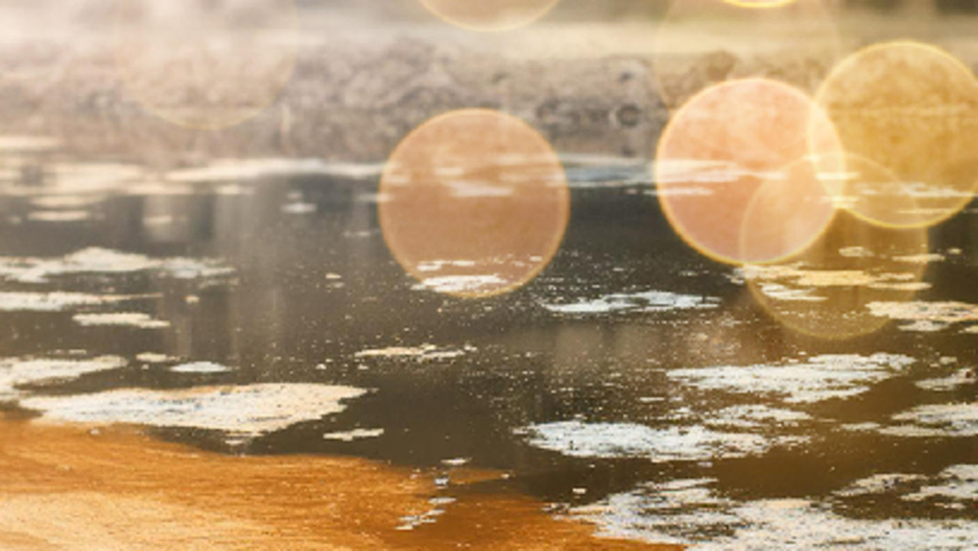 Abstract and blurred stagnant, dirty water 