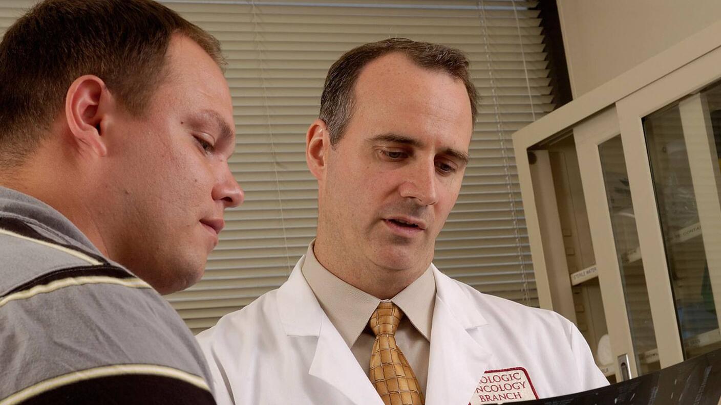 Male patient talking with a male doctor