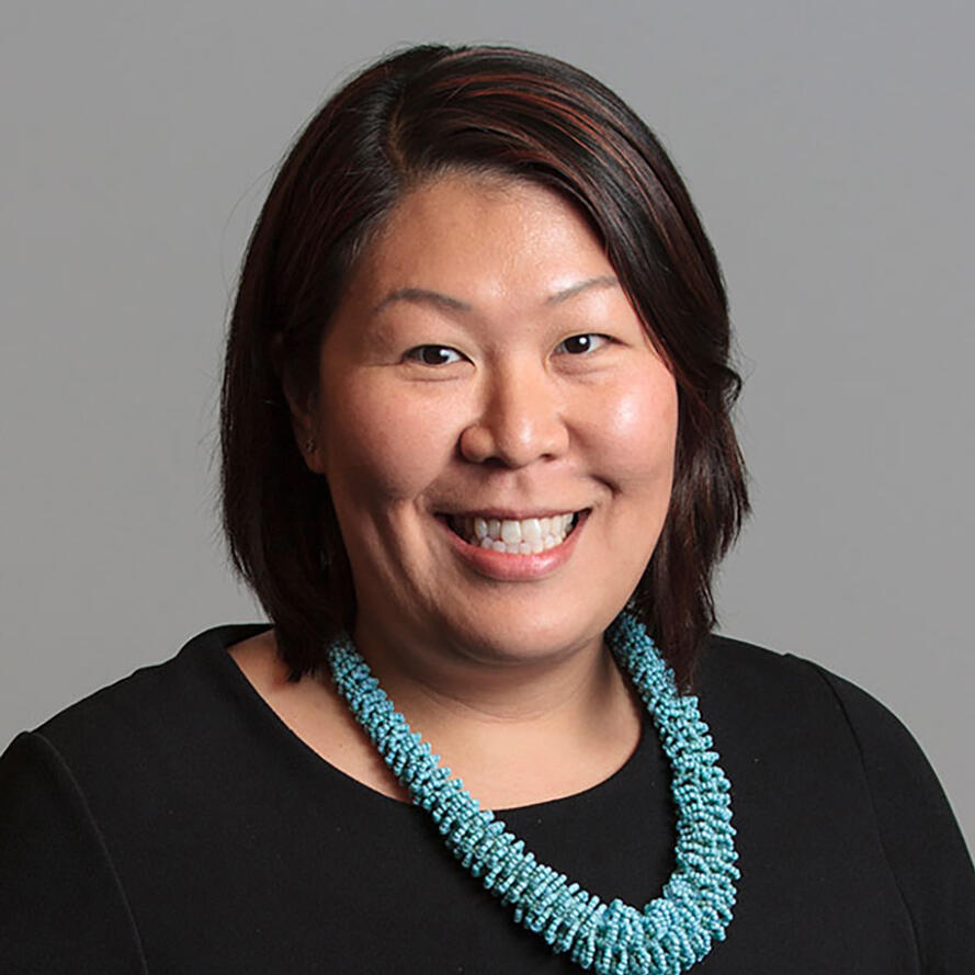 Hannah Yang, Associate Director, Scientific Operations (facing right)