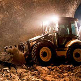 Bulldozer that runs on diesel in a mine.