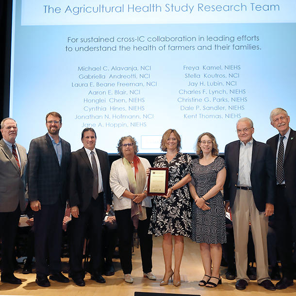 The Agricultural Health Study Research Team, including Laura Beane-Freeman, Gabriella Andreotti, and Jonathan Hofmann, receive NIH Director's Award from Francis Collins
