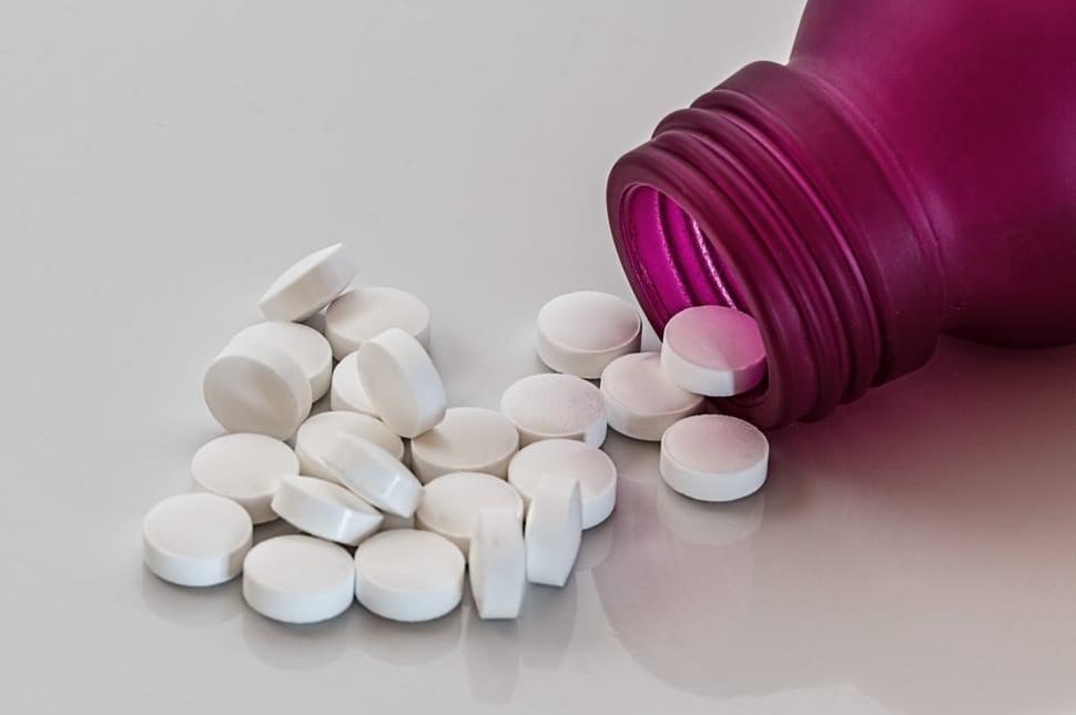 Round, white medication pills