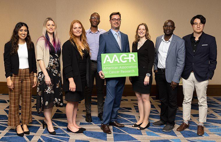 The AACR Associate Council, which includes Wayne Lawrence, research fellow in the Metabolic Epidemiology Branch. From left to right: Safa Majeed, Kristin Altwegg, Katie Campbell, Wayne Lawrence, Francesco Caiazza, Kristin Anderson, Mathias Seviiri, and James SeongJun Han. 