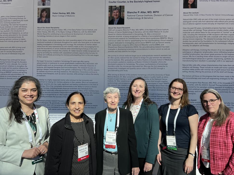 Five colleagues from Clinical Genetics Branch pose for a picture with Blanche Alter at the 2023 ASH Conference