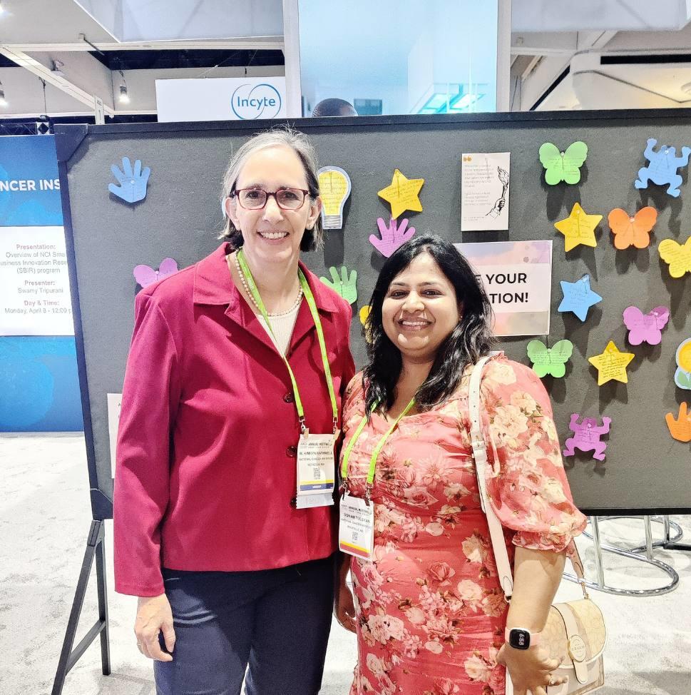 photograph of Sonam Tulsyan and Kim Rathmell at AACR 2024