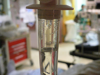 Close up of chemotherapy IV drip in a hospital setting. Chemotherapy for childhood cancer associated with elevated risk of leukemia.