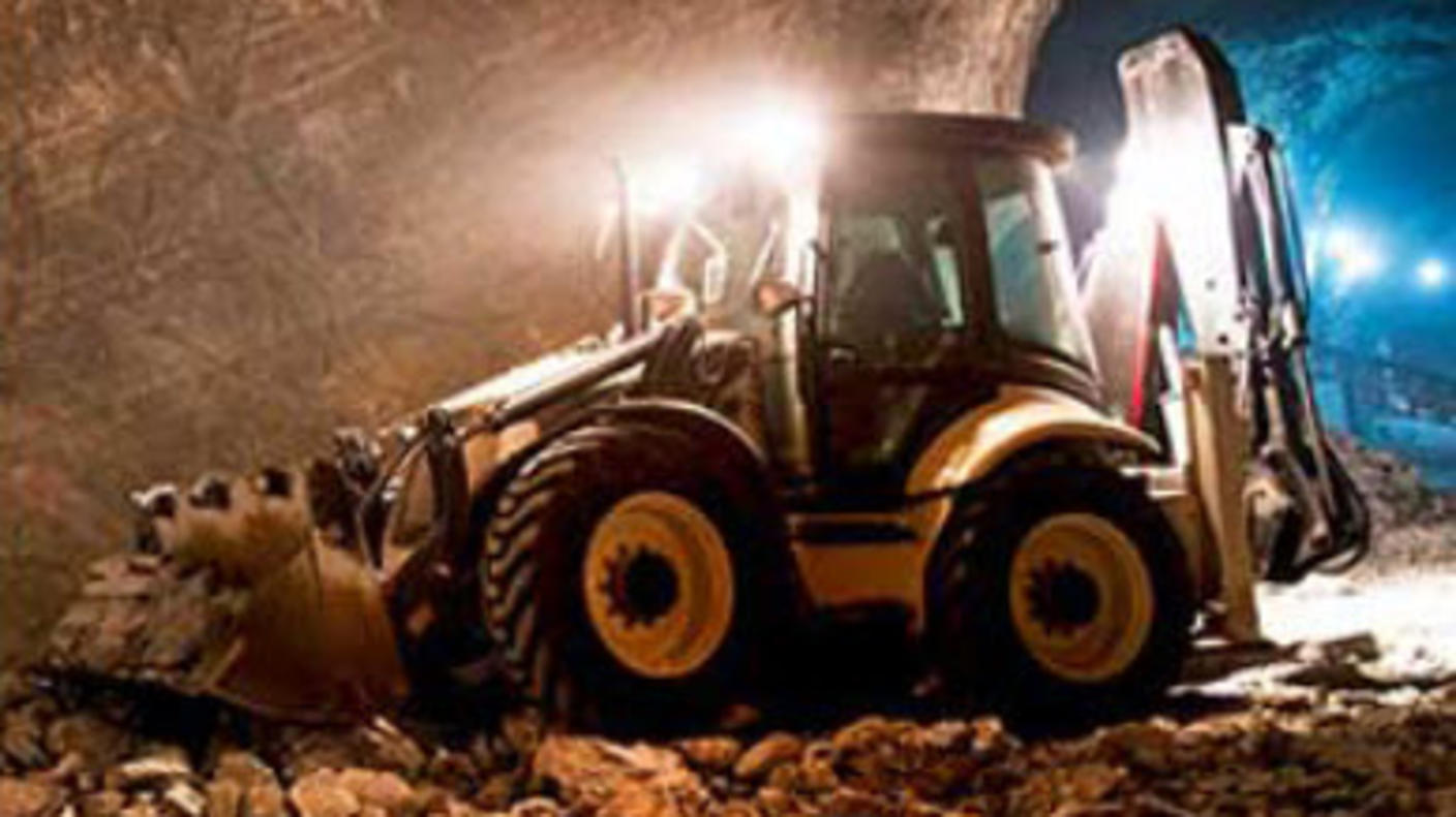 Bulldozer that runs on diesel in a mine.